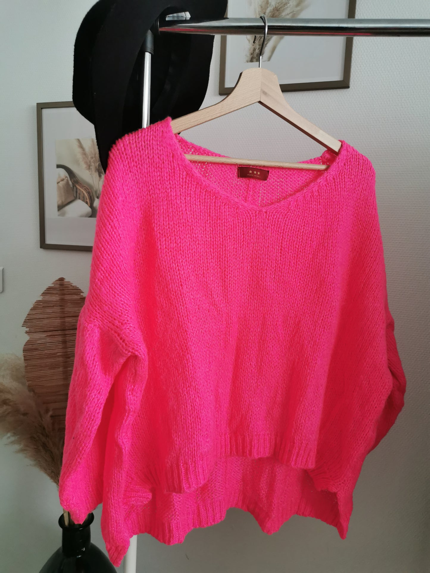 Pull ajouré rose fushia