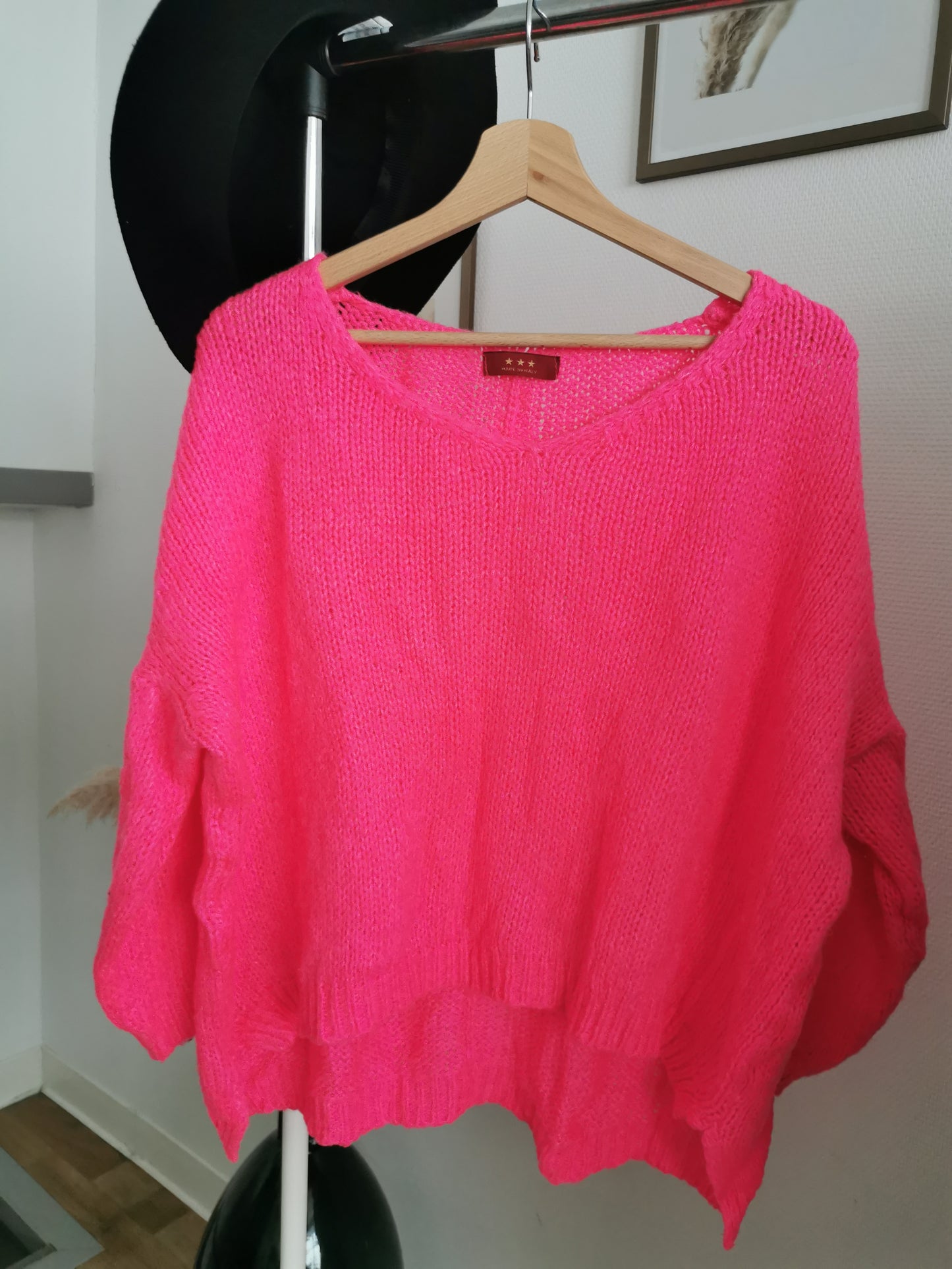 Pull ajouré rose fushia